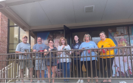 Red Wing staff painting railings at Red Wing YMCA